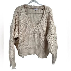 525 Distressed V neck sweater